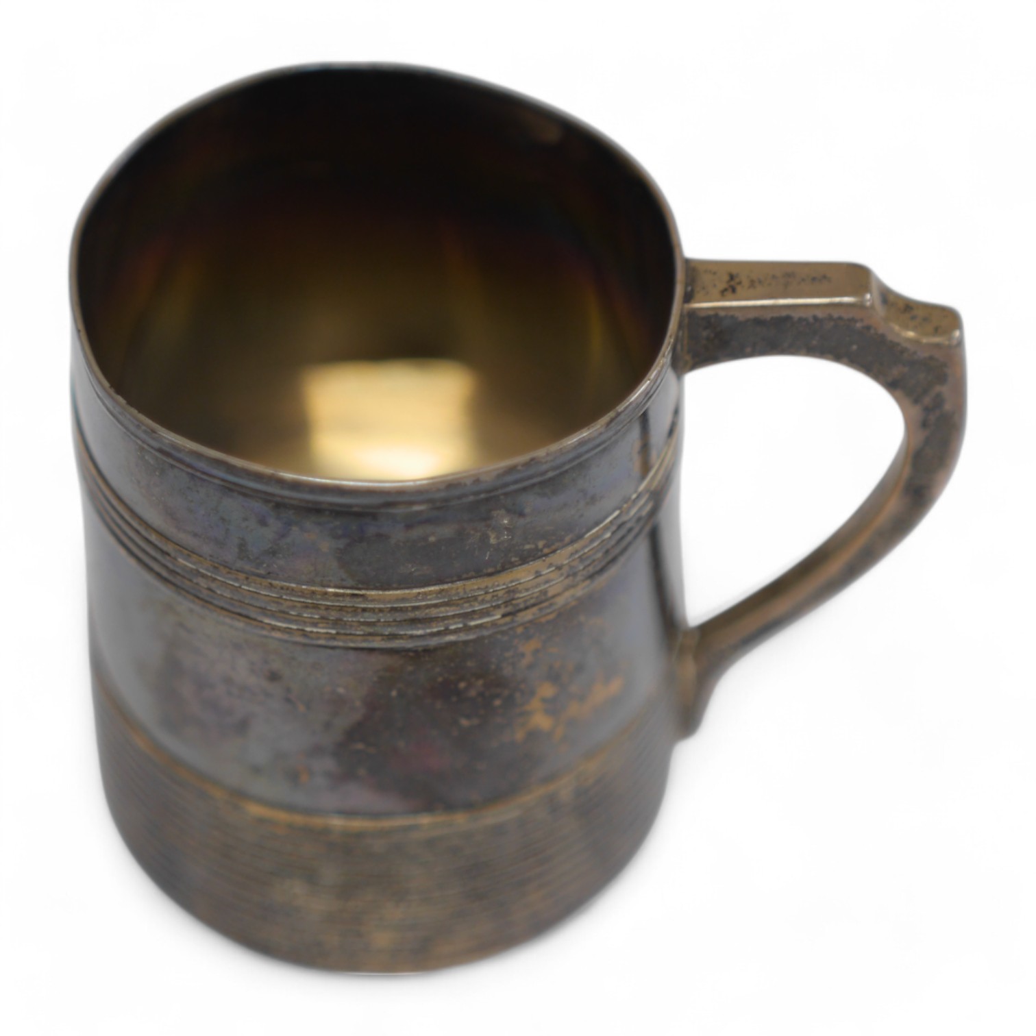 A small George III reeded silver christening mug, Walter Brind, London, 1788, 67mm, 109 grams. Condition - poor to fair